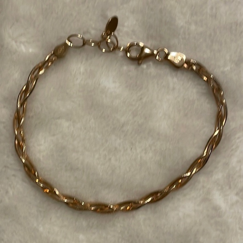 Sterling silver (925) braided bracelet.
